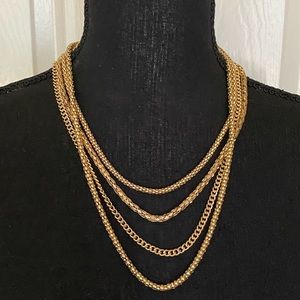 New gold metal four strand chain necklace